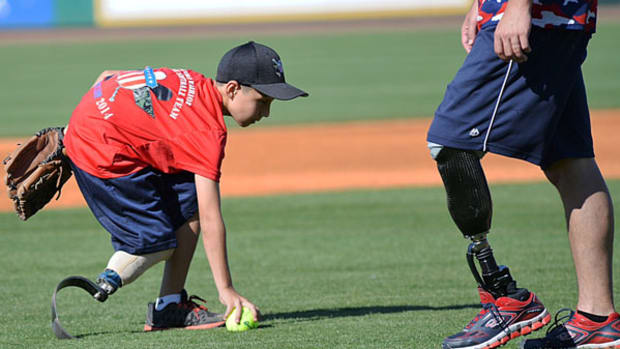 Young Amputees Team Up with Wounded Warriors at Softball Camp